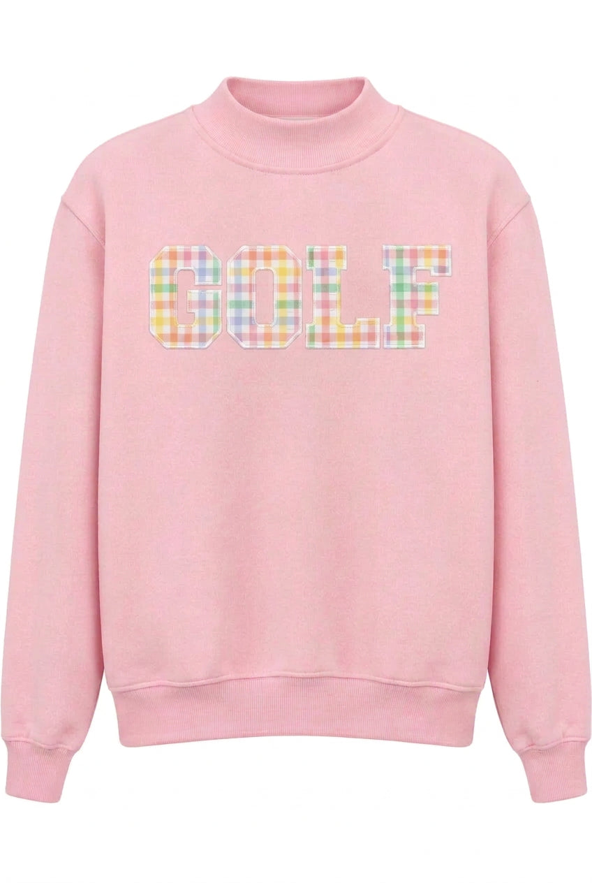 A light pink crewneck sweatshirt featuring the word 'GOLF' printed across the chest in a pastel multicolor gingham plaid pattern, shown against a plain white background.
